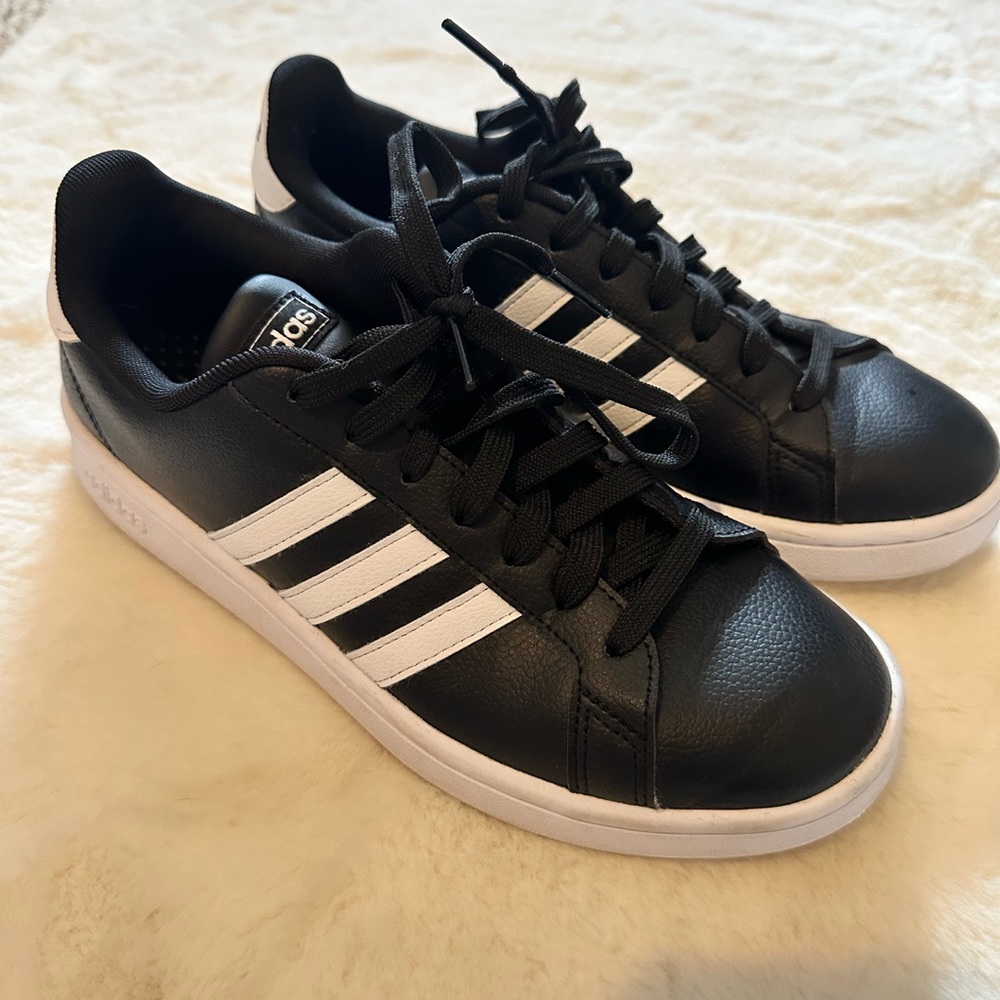 Women adidas. Size 8. Black leather.